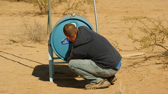 checking-desert-water-barrels