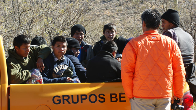 young-migrants-desert-truck